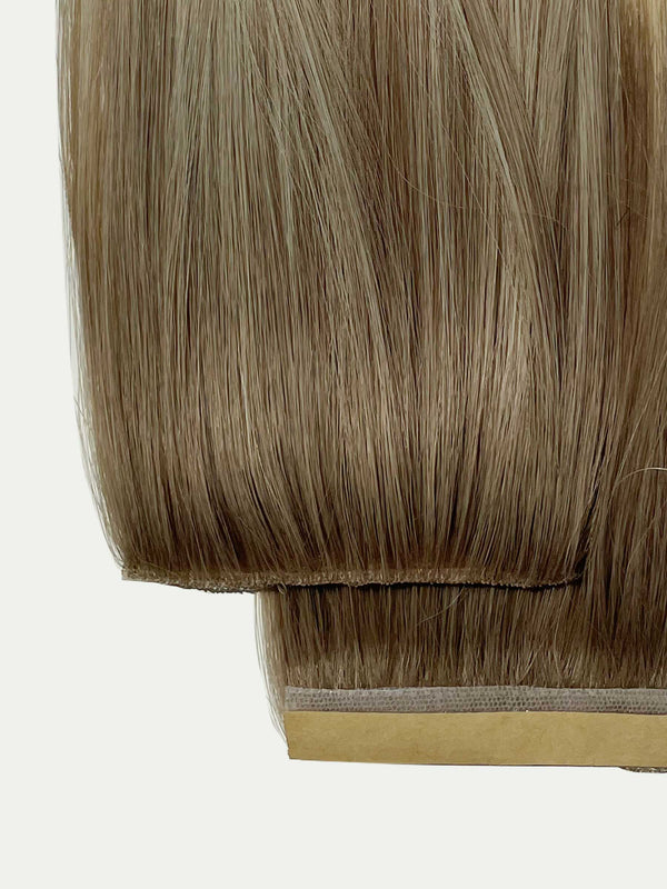 Rooted ashy blonde HD Tape-In Extensions
